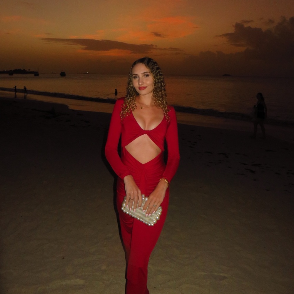 Red twist front vacation dress with drape in front and cutout